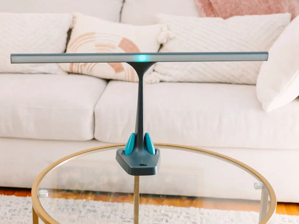 Light bar used in EMDR therapy resting on a table, representing bilateral stimulation during a session.